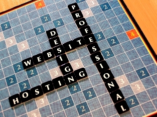 This photo of a Scrabble-board representation of Professional "Web Hosting" and "Website Design" was taken by Michal Koralewski of Gniezno, Poland. 